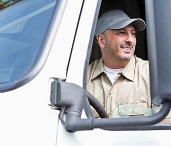 Man driving semi-truck