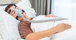 man with cpap machine