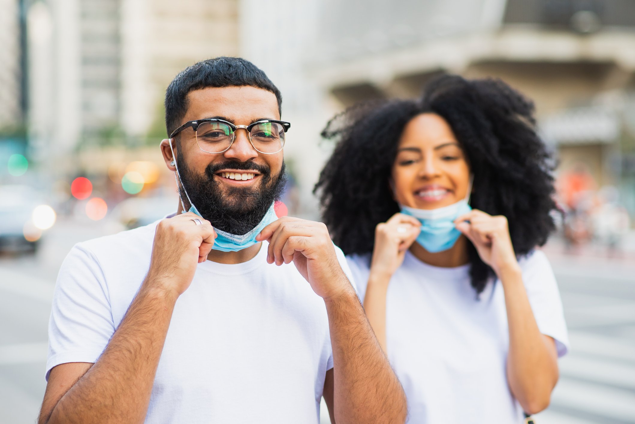 Couple Removing their masks