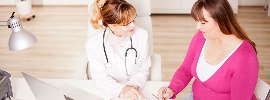 Female patient with doctor