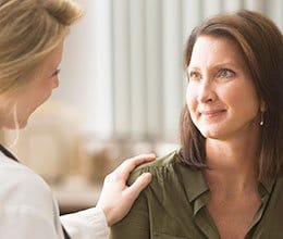 female patient with doctor