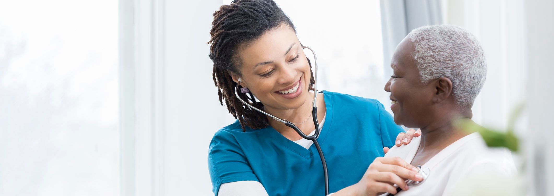 provider listening to patient's heart