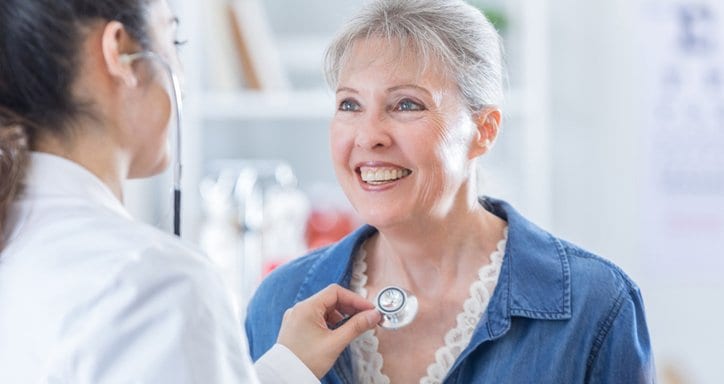 doctor listening to patient's chest