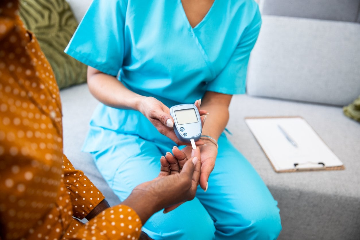 patient receiving glucose level blood test