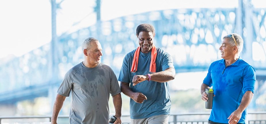 Three men hanging out after a jog 